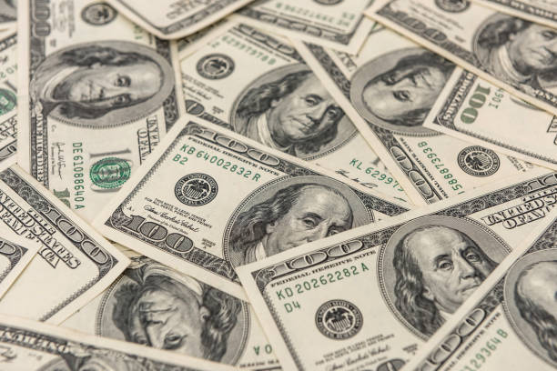 istock 100 one hundred us dollar banknotes as seamless texture and background for design 1251307549