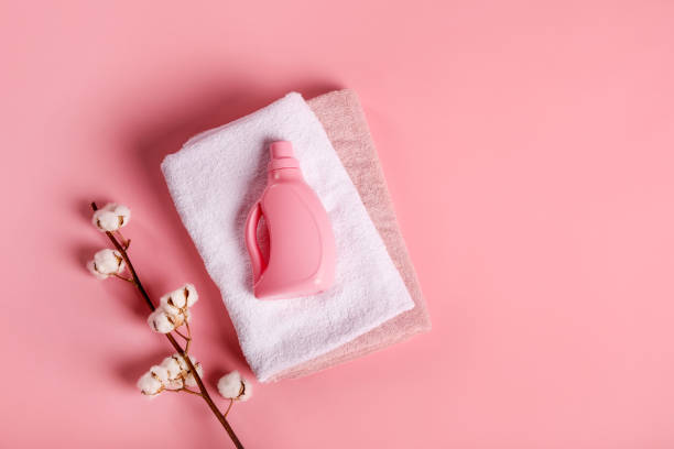 istock Bath towels and detergents on pink background 1251308719