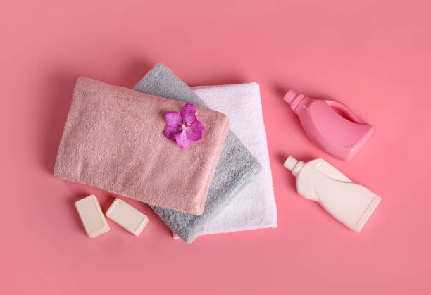 istock Bath towels and detergents on pink background 1251308772
