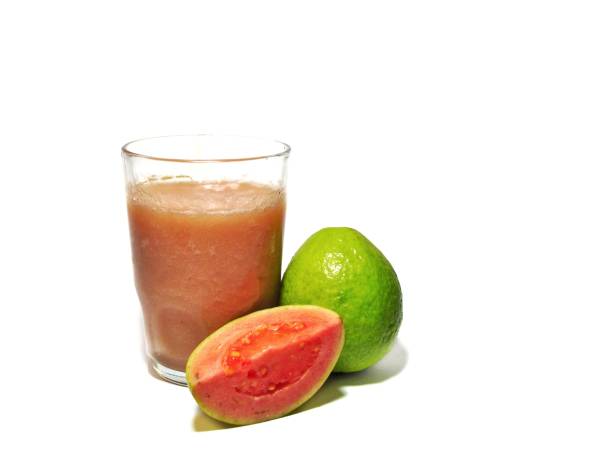 istock Freshness guava juice isolated on white background 1251309090