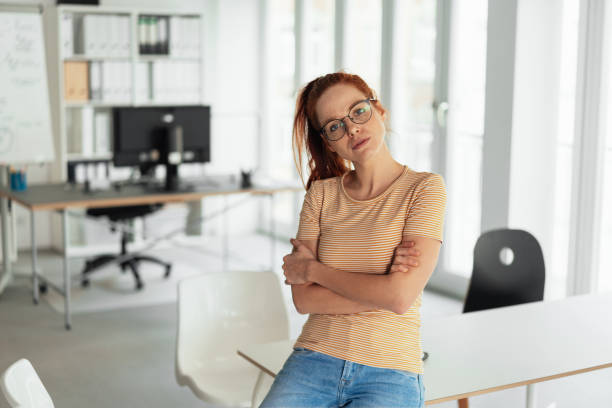 istock Thoughtful woman giving camera an assessing look 1251309438