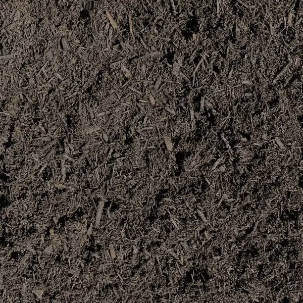 Photo of Black hardwood mulch texture abstract background