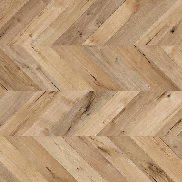 textura laminada de roble de espiga chevron - oak floor fotografías e imágenes de stock