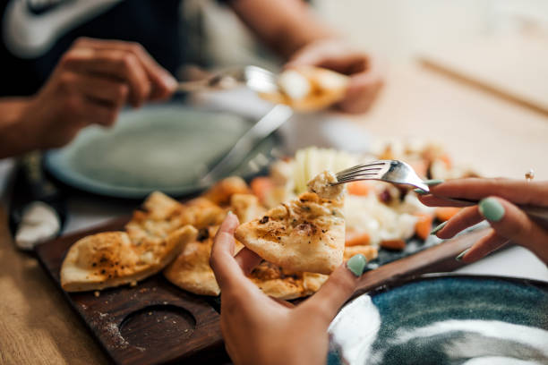 istock Eating delicious fast food at restaurant, close-up. 1251314033