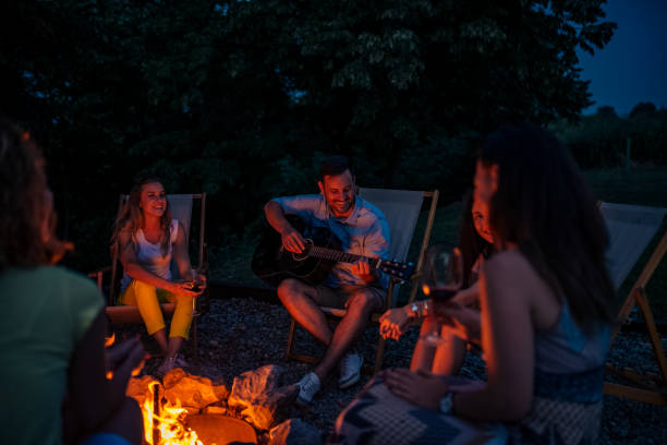 istock Summer vacation concept. Enjoying around the bonfire. 1251314050