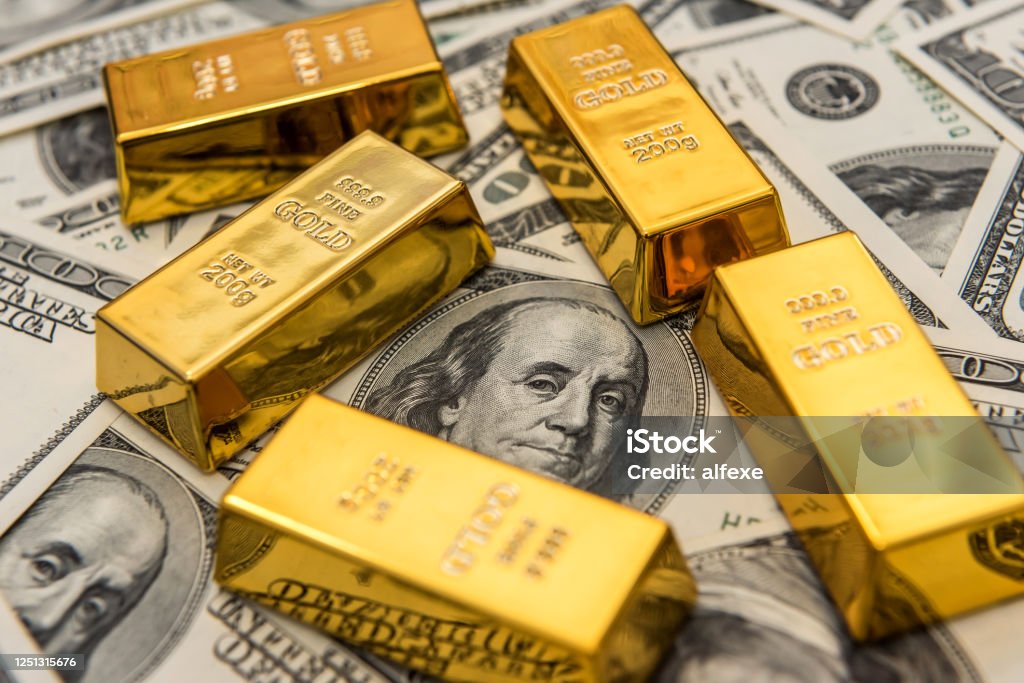 Lot Of Gold Bars On Dollar Bills Background Save Money Concept Stock Photo  - Download Image Now - iStock