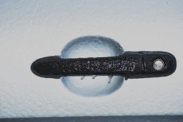 istock frozen white car door lock,Black car 1251318153