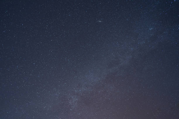 istock night landscape view milky way and star reflection on water in dam 1251318200