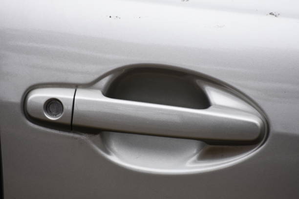 istock car door lock,white silver  car 1251318404