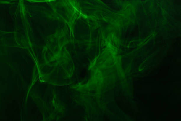 istock Green steam on a black background. 1251318533
