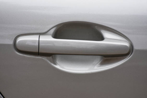 istock car door lock,white silver  car 1251318556