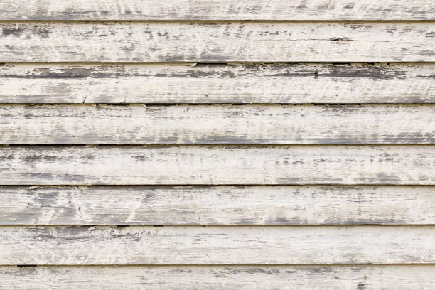istock White painted rustic wood planks background with flaking paint. Stavanger, Norway. 1251322224