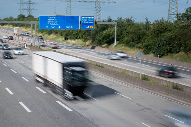 istock Blurred motion of dense traffic on German highway 1251322241