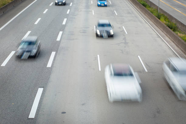 istock Blurred motion of dense traffic on German highway 1251322311