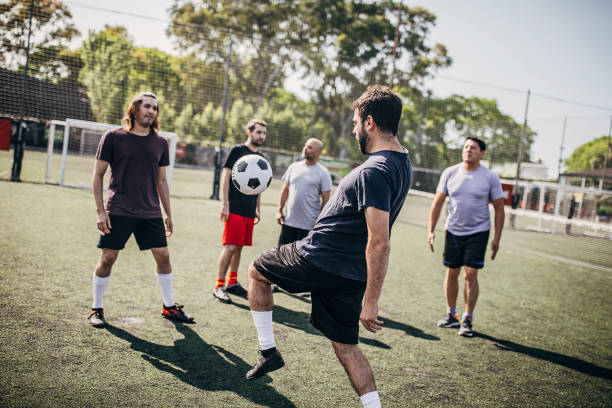 istock Male soccer players preparing for a match 1251323700