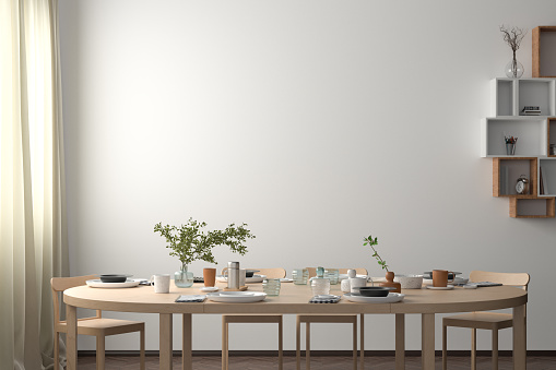 Blank wall mock up in the dinning room with served table.