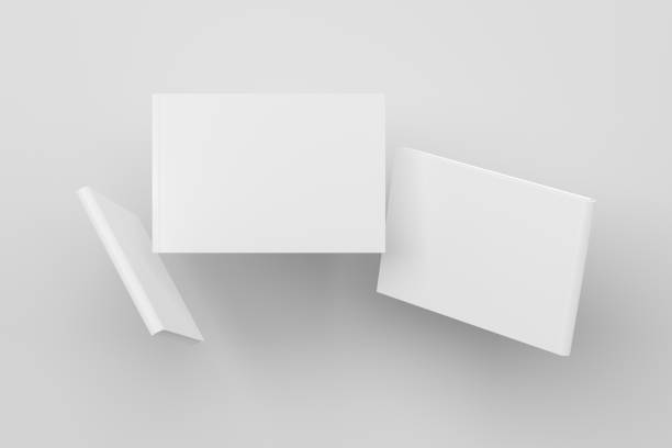 istock Horizontal blank book cover mock up flying. Front, spine and back cover views. 1251324495