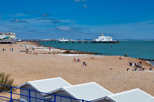 Eastbourne, Sussex, England, UK - Aug 30, 2019: Tourists and visitors were attracted to Eastbourne Pier by the beautiful spring weekend weather, Eastbourne, East Sussex