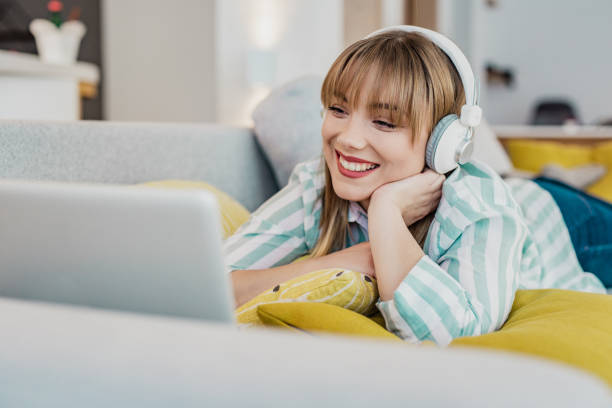 istock Young woman listening online course 1251330979
