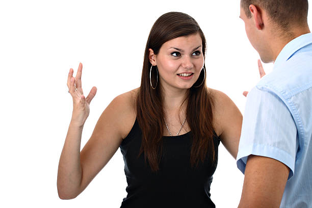 istock Young couple having an argument isolated on white 125133329