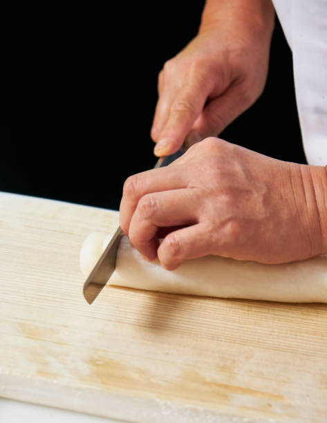 istock White Kamaboko loaves sliced by chef 1251333395