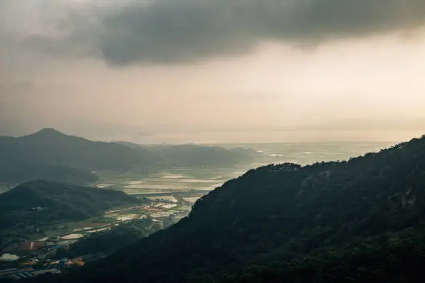 Sunset of Ganghwado Island mountains from Goryeosan mountain Jeokseoksa temple in Incheon, Korea