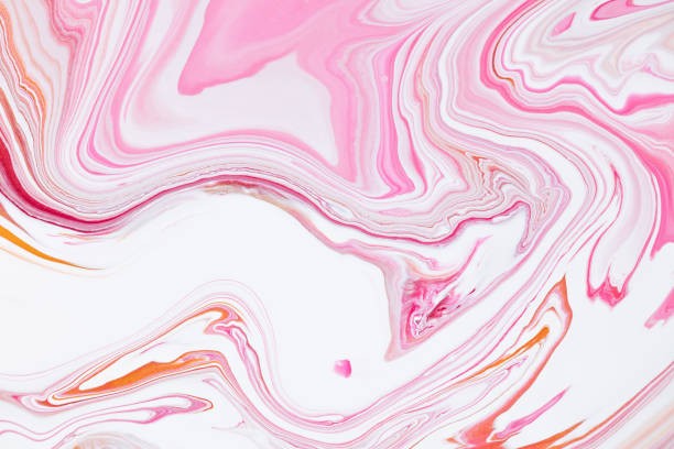istock Fluid art texture. Abstract backdrop with iridescent paint effect. Liquid acrylic picture with flows and splashes. Mixed paints for background or poster. Pink, coral and golden overflowing colors. 1251336187