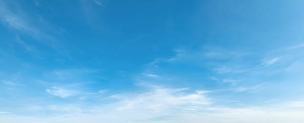 istock panorama blue sky with cloud and sunshine background 1251339034