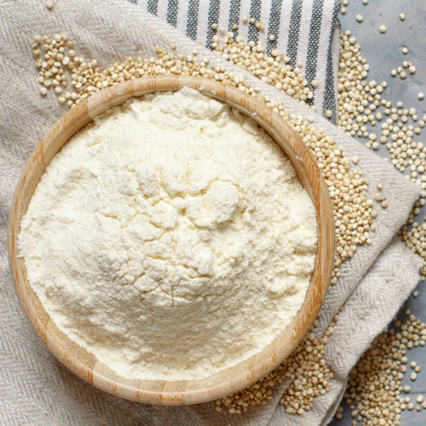 istock Raw white quinoa floour and seeds top view 1251340882
