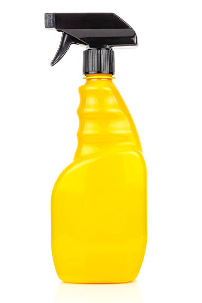 istock Bright yellow spray bottle isolated on white background 1251341762
