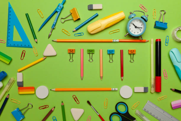 istock Back to school, stationery set on green background 1251342047