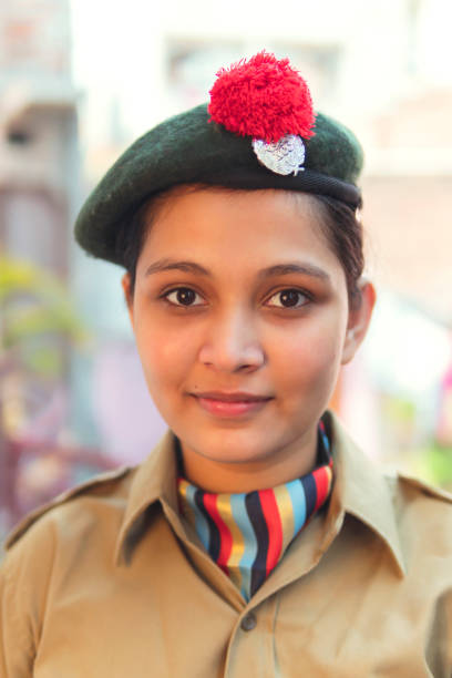 Portrait of happy young girl wearing NCC uniform. Indian Portrait of happy young girl wearing NCC uniform.outdoor shoot . copy space. indian navy stock pictures, royalty-free photos & images