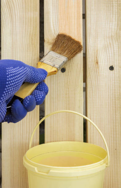 istock Application of liquid antiseptic on a wooden grid 1251345941