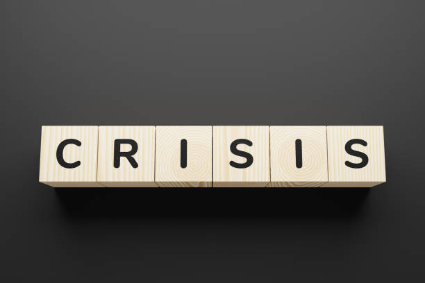 istock CRISIS word written in wooden blocks. 1251345979