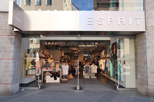 People visit Esprit fashion store at Karolinenstrasse shopping street in Nuremberg, Germany.