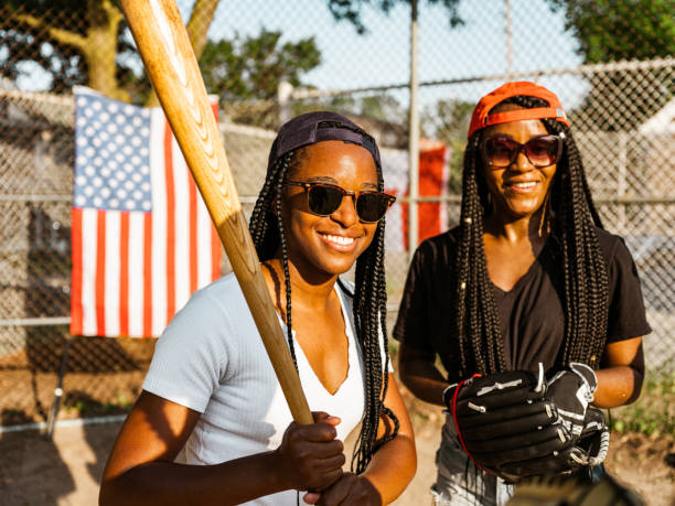 istock Diverse group of young women playing softball 1251350193