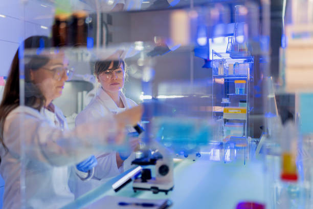istock Female scientists during research. Studying samples in futuristic laboratory 1251350331
