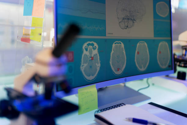 istock Futuristic laboratory equipment. Brainwave scanning research on computer screens 1251350504