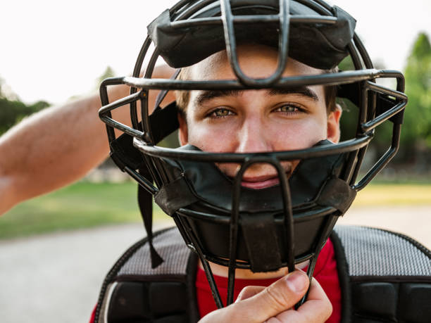istock Young catcher and the coach 1251350530