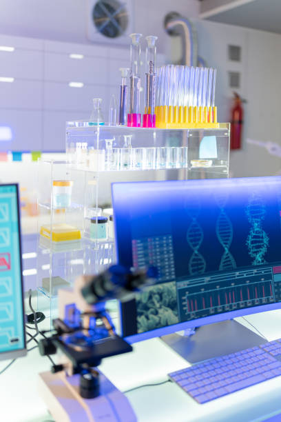 istock Futuristic laboratory equipment. DNA scanning research on computer screens 1251352175
