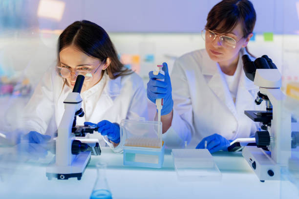istock Female scientists during research. Studying samples in futuristic laboratory 1251352278