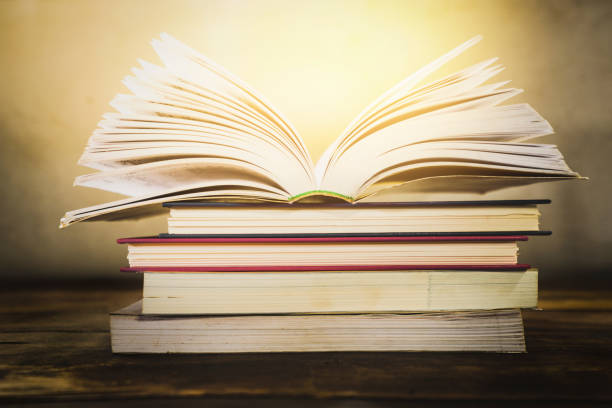 istock open book and grunge background 1251352411