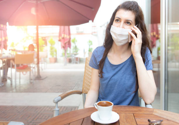 istock Woman with face protective mask 1251352454