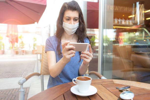 istock Woman with face protective mask 1251352581