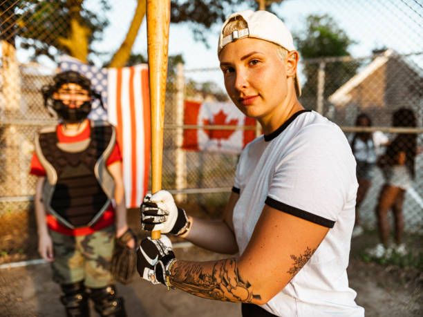istock Diverse group of young people playing softball 1251353671