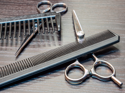 Comb and scissors hair salon
