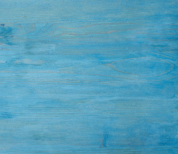 istock Blue wooden background with copy space. textured 1251355714