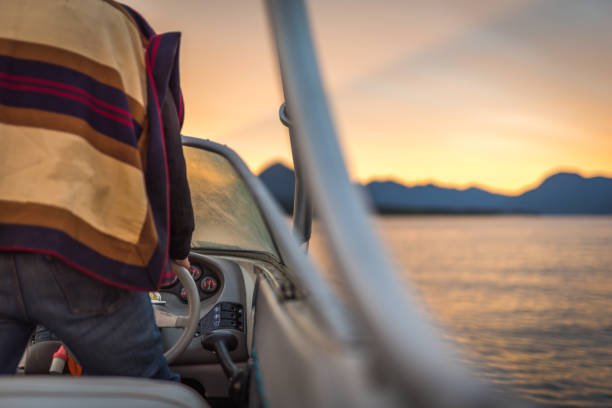 Amazing morning over a speed boat with warm colors and mountain at front