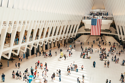 New York, NY, USA - May 27, 2019: The Oculus is an architectural structure by archistar Santiago Calatrava, it is the World Trade Center Transportation Hub for subway and trains. It is also a retail mall.