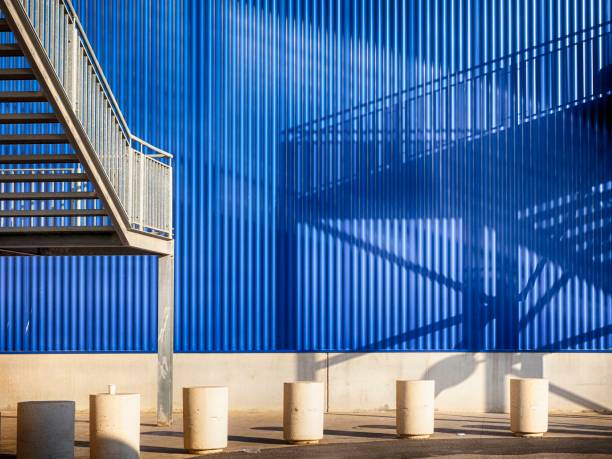 istock Metallic stairs outside a warehouse 1251359418